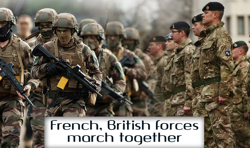 In a show of solidarity, French and British forces march together